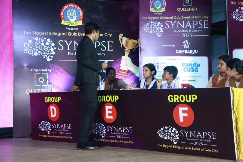 Group rounds on stage, Synapse 2025